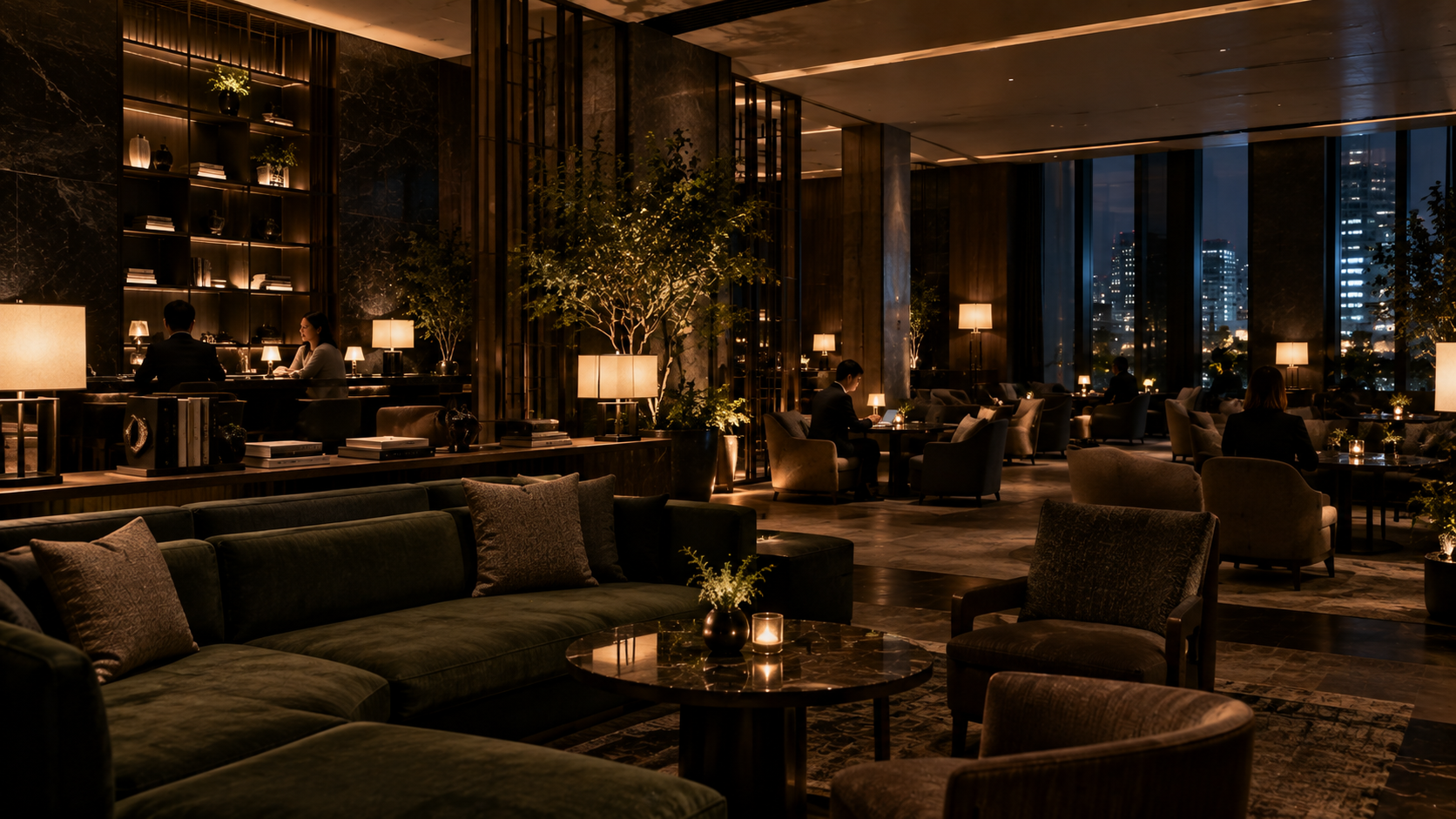 落ち着いた照明とソファを備えたHOTEL NESTRAのロビー